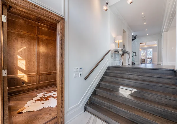 Bevdale Road: Wood steps beside a panelled study entrance