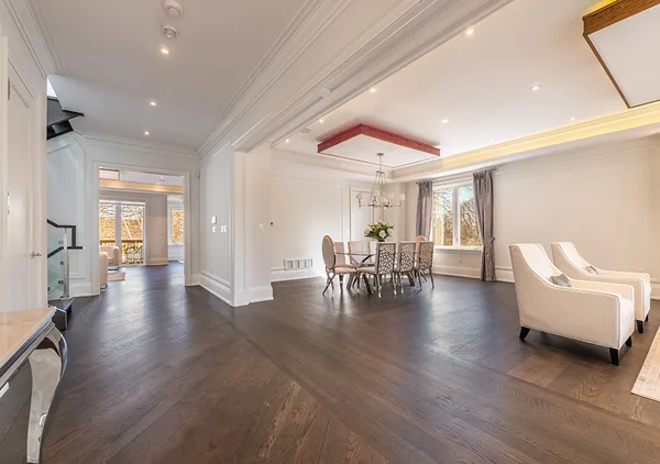 Bevdale Road: Open living and dining spaces with dark wood floors