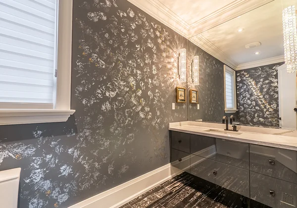 Bevdale Road: Powder room with dark patterned walls and floating vanity