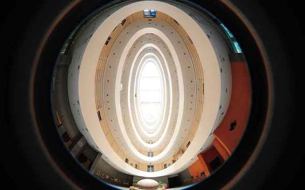 Grand China: Oval interior atrium viewed upward toward the glazed roof