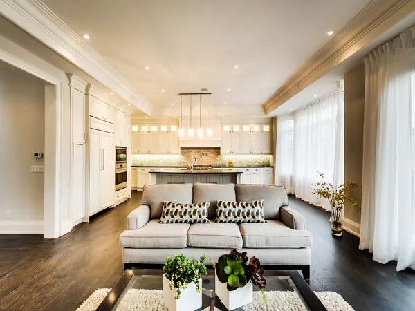 Joicey Boulevard 2: Family room opening into the white kitchen