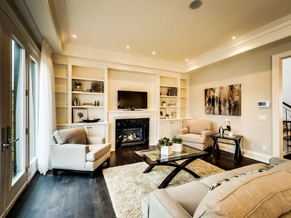 Joicey Boulevard 2: Family room with fireplace, built-in shelves and wood floor