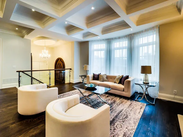 Joicey Boulevard 2: Living room with coffered ceiling and white armchairs
