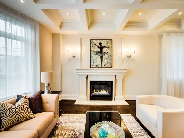 Joicey Boulevard 2: Living-room fireplace and seating below a coffered ceiling