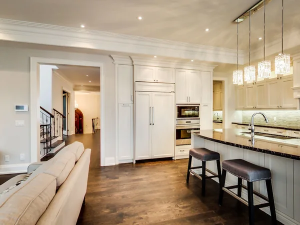 Joicey Boulevard 2: Kitchen island seating beside the family-room sofa