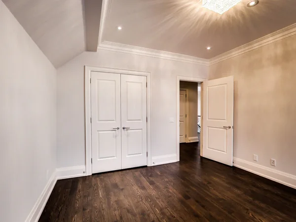 Joicey Boulevard 2: Empty bedroom with built-in wardrobe and wood floor