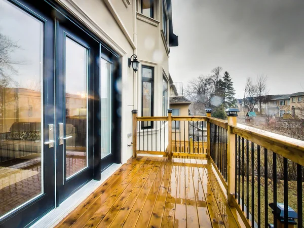 Joicey Boulevard 2: Timber deck running beside large glazed doors
