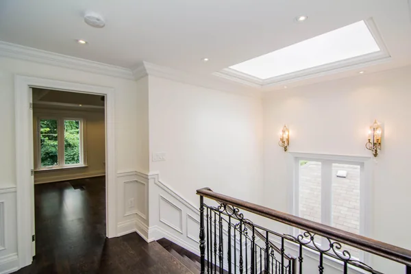 Joicey Boulevard: Upper landing with metal balustrade and rectangular skylight
