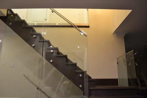 Nevada Avenue: Open wood staircase with glass balustrade