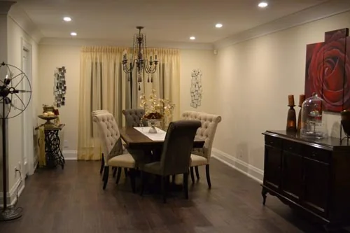 Nevada Avenue: Dining room with chandelier, upholstered chairs and wood floor