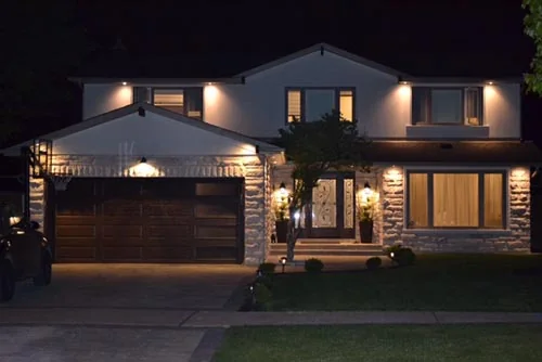 Nevada Avenue: Front exterior of the house illuminated at night