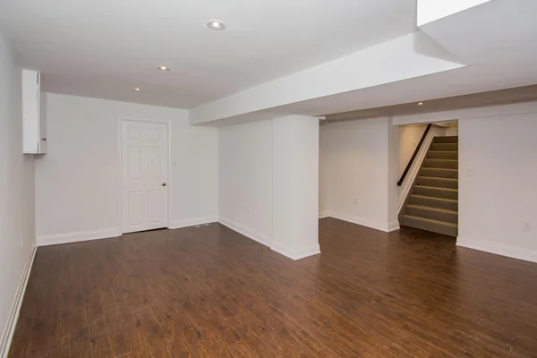 Tilman Circle: Lower-level open space beside the staircase